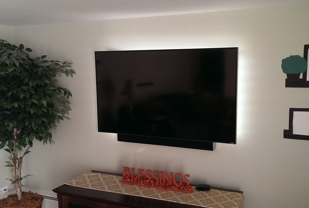 TV Mounting with Soundbar and LED Backlights